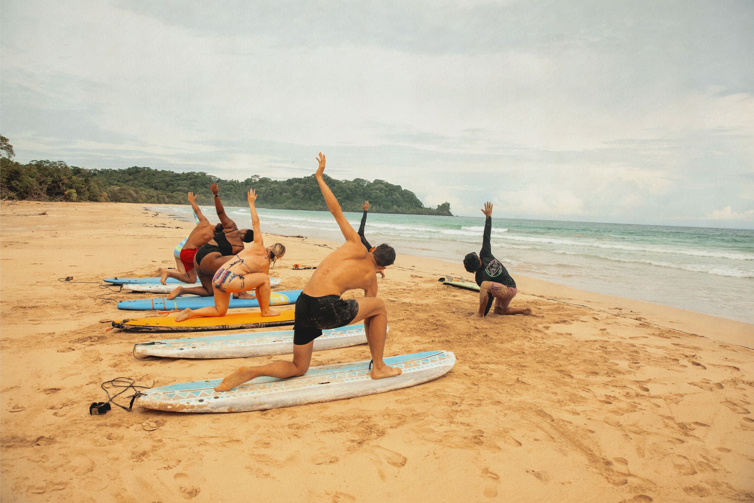 Community members learning to surf