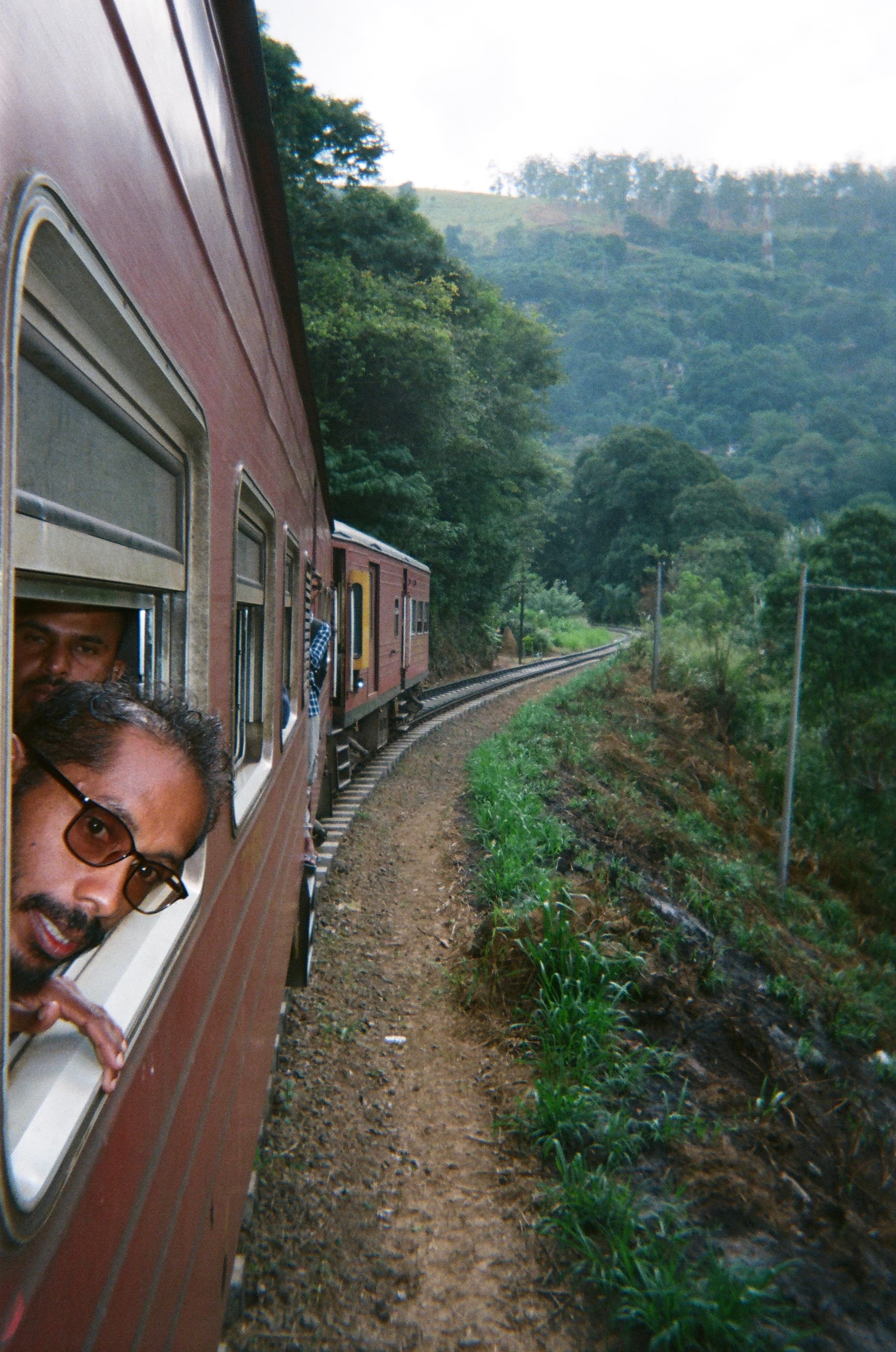 Community members on a long train journey